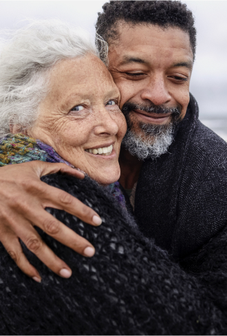 55+ couple embracing